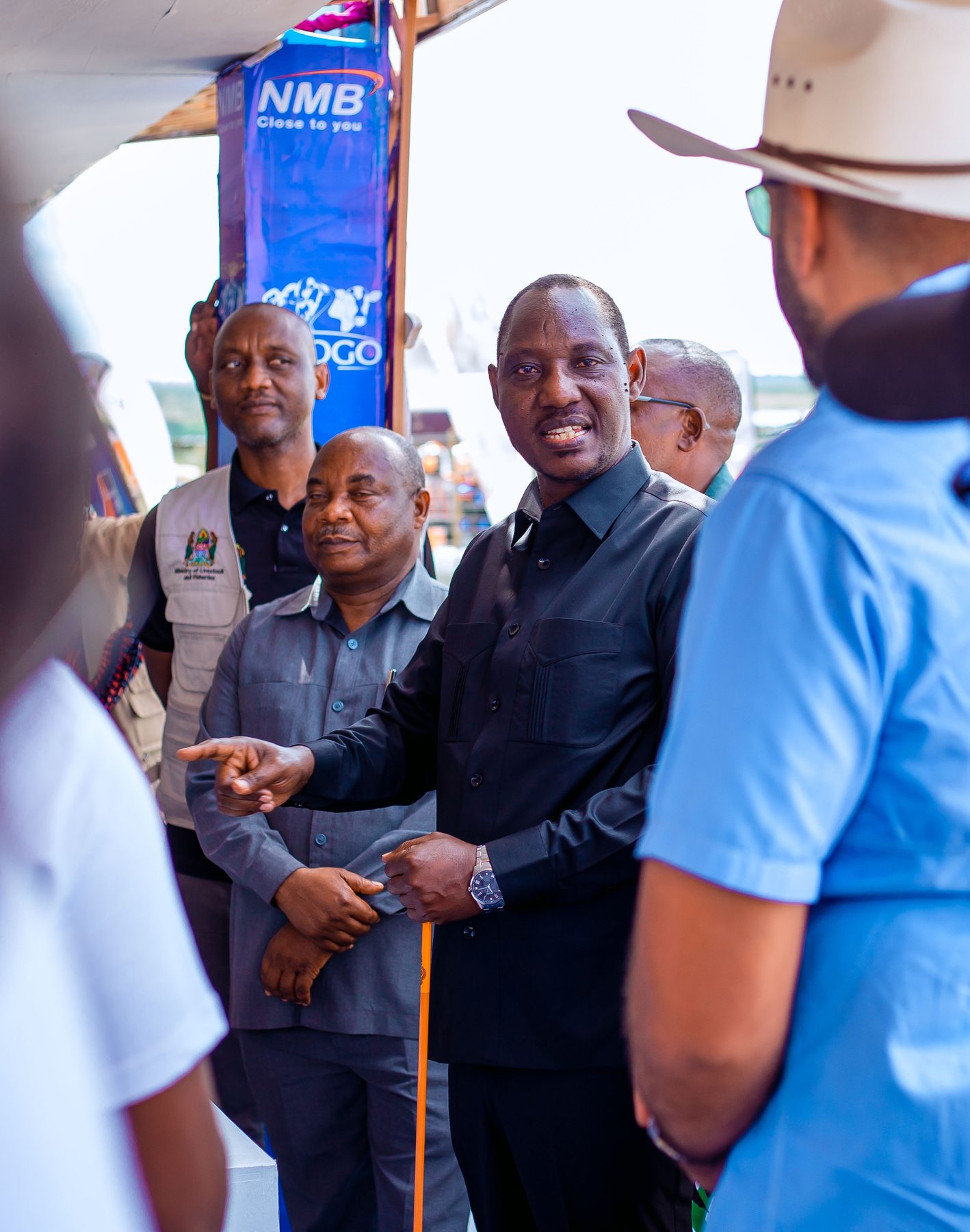 Government livestock officials touring the NMB booth at Ubena Zomozi
