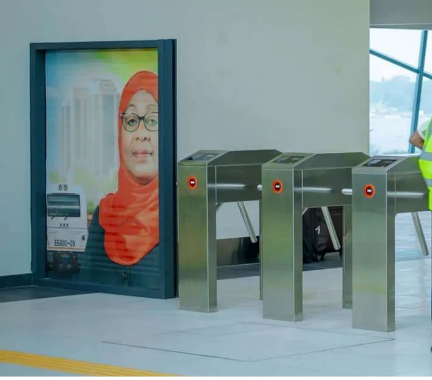 SGR station turnstile gates with government branded lightbox display