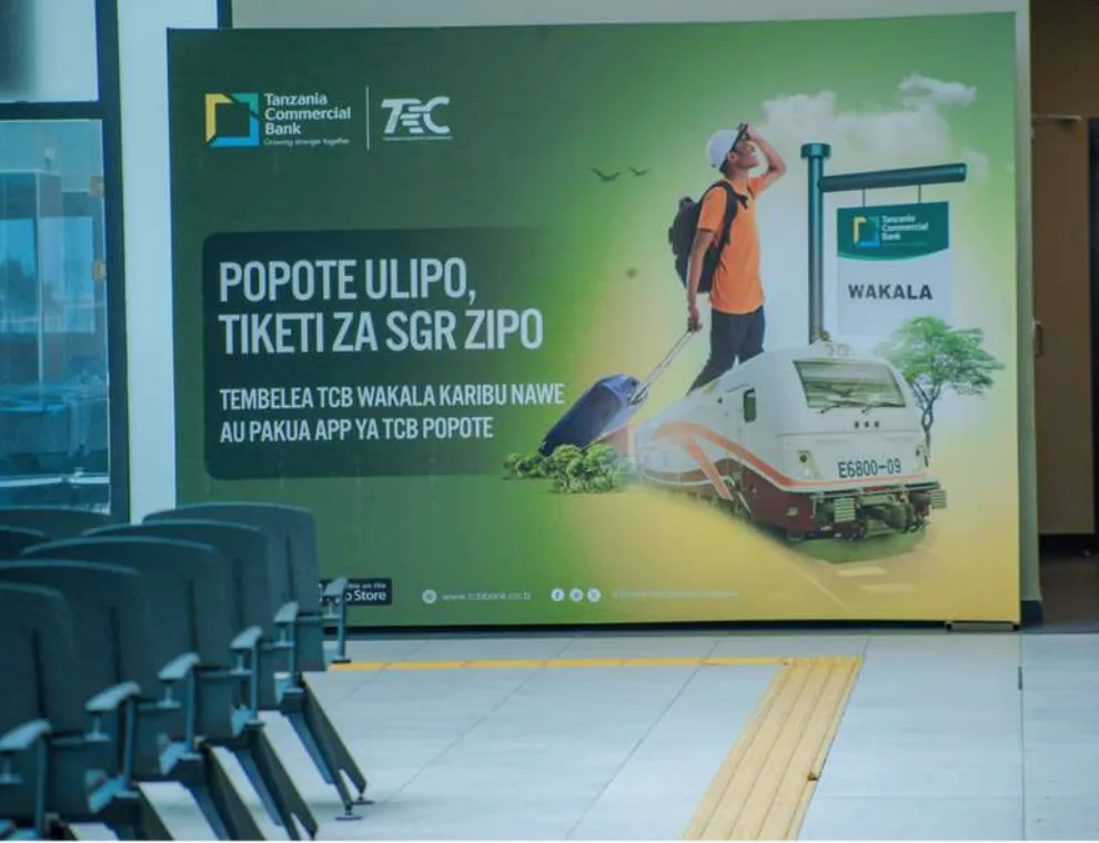 TCB Bank branded backdrop in an SGR station waiting area