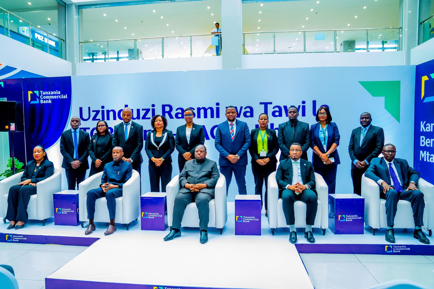 Official group photo on stage at the TCB Ubungo branch launch