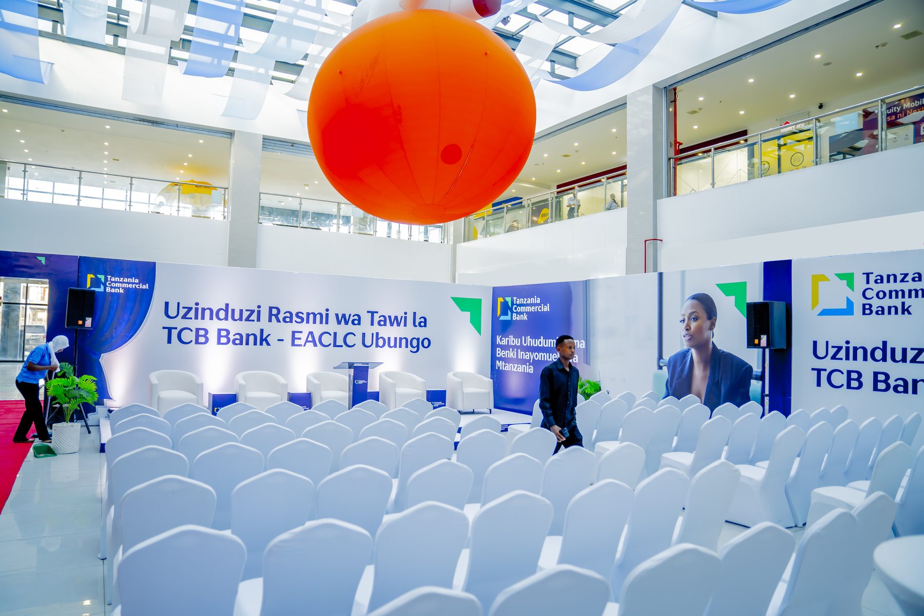 Branded atrium stage and seating set up ahead of the TCB Ubungo branch launch