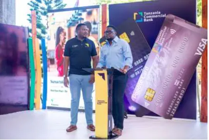 TCB staff at the branded Visa Card launch booth at TCB HQ